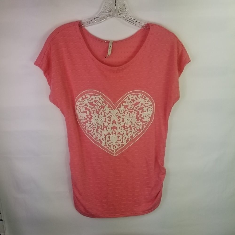 Peach tee with lace heart.